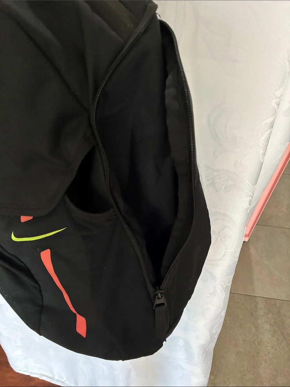 Nike Black Backpack with Neon Yellow Swoosh and Red Stripe Accents